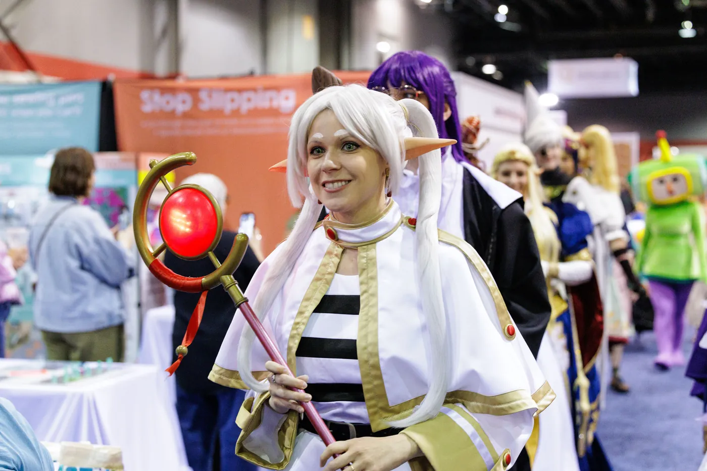 A competitor on stage at the h+h americas Cosplay Competition