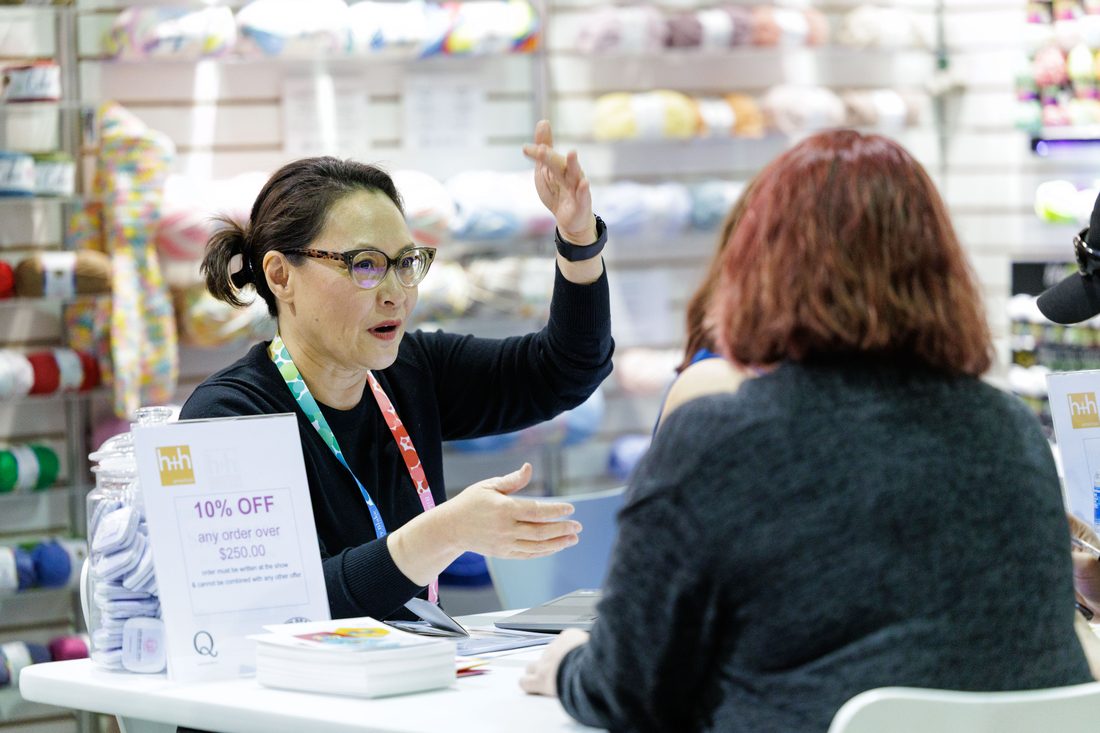 Product and labels at an exhibitor booth counter